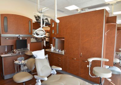 Dental operatory suites with wooden cabinet barriers