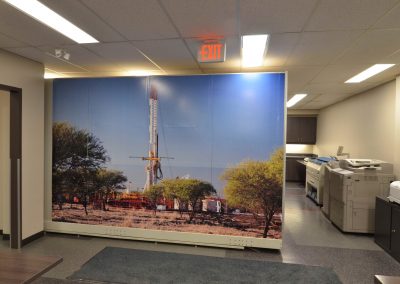 Corporate office mural separating printing area