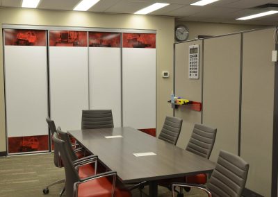 Private boardroom with meeting table and chairs