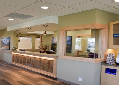 Wooden accents in waiting room area of dental clinic