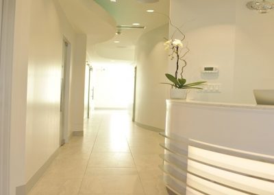 Natural lighting coming through dental clinic hallway