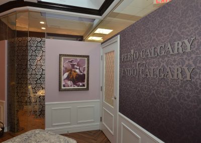Violet damask wallpaper in front entrance of perio clinic