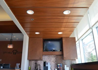 Wooden paneling above waiting room coffee bar
