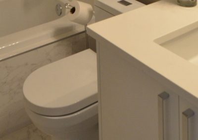 Matching white bathroom sink toilet and tub
