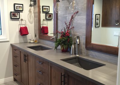 Renovated bathroom with custom cabinets and double sinks