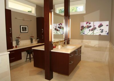 Large bathroom remodel with matching sinks separated by a shared mirror