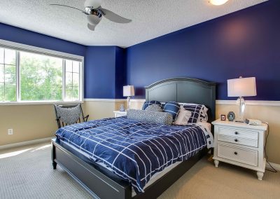 Blue and white interior styled bedroom