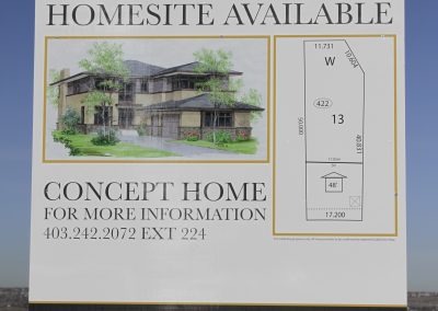 Sign on lot featuring a new homesite available with information on the lot