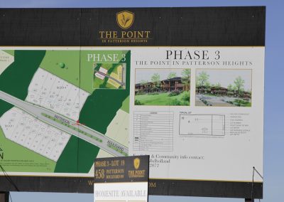 Sign on lot featuring phase 3 information available with information on the lot