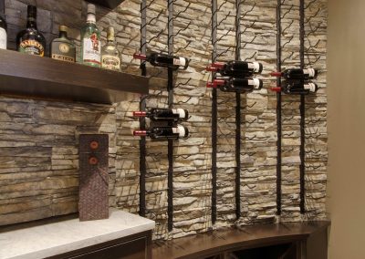 Custom built wine rack next to bar