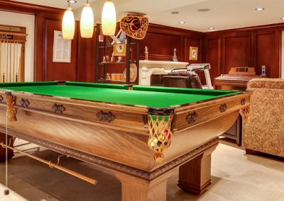 Downstairs entertaining area with large screen tv and pool table