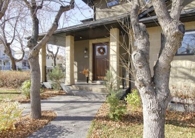 Front walkway leading up to corner lot
