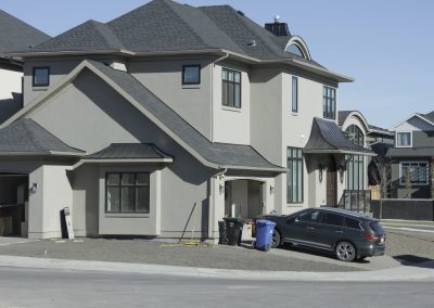 New custom home in Aspen Ridge Estates on the corner lot with two driveways