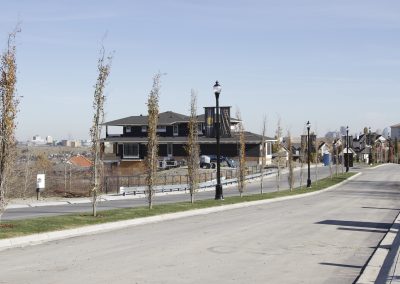 Road view of the main boulevard in Calgary's new community, Patterson Heights