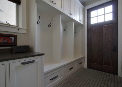newly renovated mudroom attached to side door of house