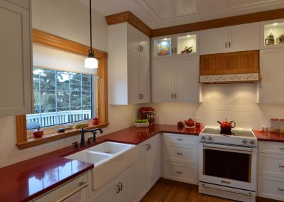 Farmhouse kitchen renovation with custom white cabinets