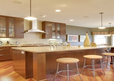 Kitchen renovation with large island and bar seating