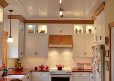 Farmhouse kitchen renovation with white wooden ceiling