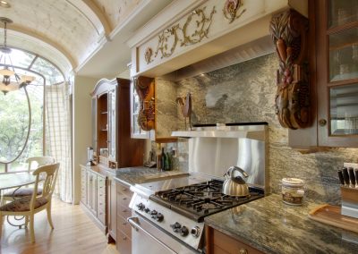 Exquisite kitchen renovation with arched ceilings and granite countertops