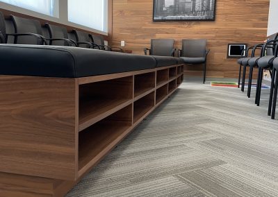 Built in magazine storage in waiting room bench