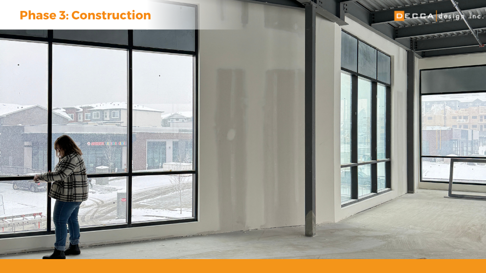 Phase 3: Construction — Bringing Your Vision to Life Without the Stress You’ve defined your goals, finalized the design, and secured your permits. Now, it’s time for your dream clinic to take shape. Construction is where ideas become reality—but it’s also where things can go off track. At Decca Design Inc., we don’t just hand over drawings and wish you luck. As a full-service Calgary interior design firm, we stay with you every step of the way. This final instalment in our 3-part series reveals how Decca Design oversees construction to protect your timeline, budget, and vision. Step 6:Project Administration — Your Advocate on Site From the first shovel in the ground to the last coat of paint, construction is complex. With multiple trades, vendors, inspections, and moving parts, small miscommunications can snowball into costly delays or rework. Why Decca Stays Involved: We compare contractor bids to ensure fair pricing We advocate for your interests during site visits We identify discrepancies early to avoid expensive change orders Real-World Impact: In one Alberta clinic project, our team saved the client $26,000 by catching an inflated contractor cost. Without Decca involved, that oversight would have been approved. Beyond the Blueprints: Coordinating What Others Overlook Construction doesn’t cover everything. What about IT, security, signage, equipment delivery, and furniture install? These final details often fall through the cracks—but not with Decca. We coordinate every non-contractor element to ensure your clinic opens on time and fully functional. That means no scrambling in the final weeks, no missing furniture, and no costly surprises. Takeaway: Construction isn’t just about building walls—it’s about executing your full vision. Step 7: Furniture, Furnishings & Final Touches Designing a high-performance clinic means planning for durability, workflow, and comfort. But it’s the furniture and finishing touches that make your space feel complete. From commercial-grade seating to custom millwork and curated artwork, we ensure everything reflects your brand and stands up to daily use. Why This Matters: Durable materials stand the test of time Artwork and finishes enhance patient comfort and staff pride Every detail reinforces your brand image and values Decca’s Full-Service Promise: We handle procurement, delivery, install, and even garbage removal. You walk into a finished space that’s ready to work as hard as you do. Step 8 (Unofficial, but Essential): Celebrate At Decca, we believe this moment deserves recognition. Opening day isn’t just the end of a project—it’s the beginning of your next chapter. We’ve celebrated with hundreds of Alberta healthcare professionals as they open their doors, welcome patients, and realize their dream has come to life. Our Promise: We don’t just build clinics. We build relationships that last. Let’s Build Your Future, Together With over 600 completed clinics and more than 25 years of experience, Decca Design helps Alberta healthcare professionals navigate the entire journey—from first sketch to ribbon cutting. Looking for a Calgary interior design firm to guide your next clinic build or renovation?